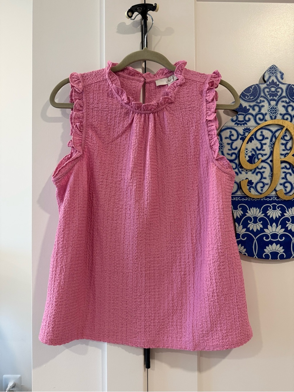 Sleeveless Ruffle Crewneck Top